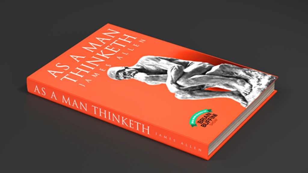 An orange book with the title "As a Man Thinketh"