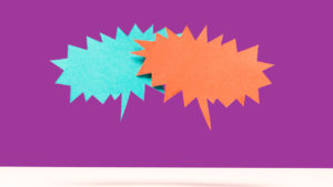 Colored text balloons on purple background