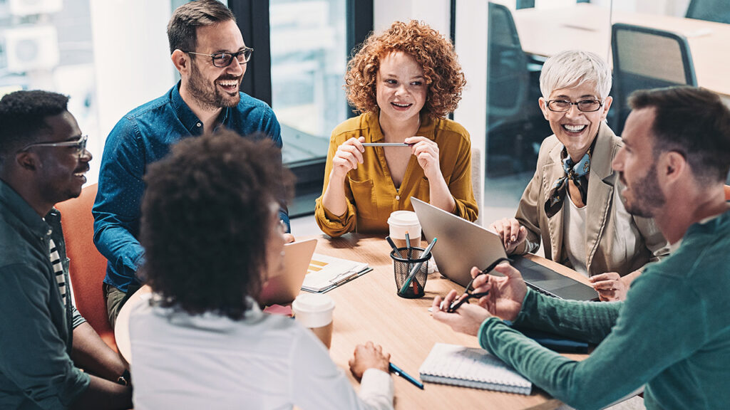 A team working together around a table.